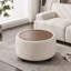 Table basse ronde avec repose-pieds rembourré avec plateau amovible-396738362