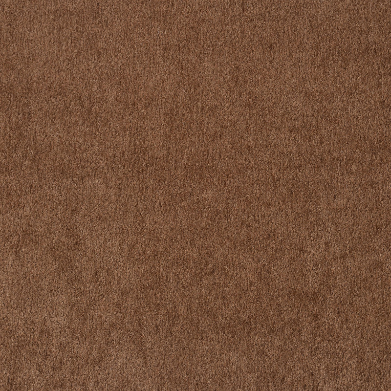 De couleur rouille, des accoudoirs encastrés et de la mousse pour une solution de siège chaleureuse et invitante.
