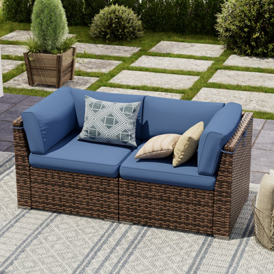 2 Piece Rattan Sectional Seating Group With Cushions