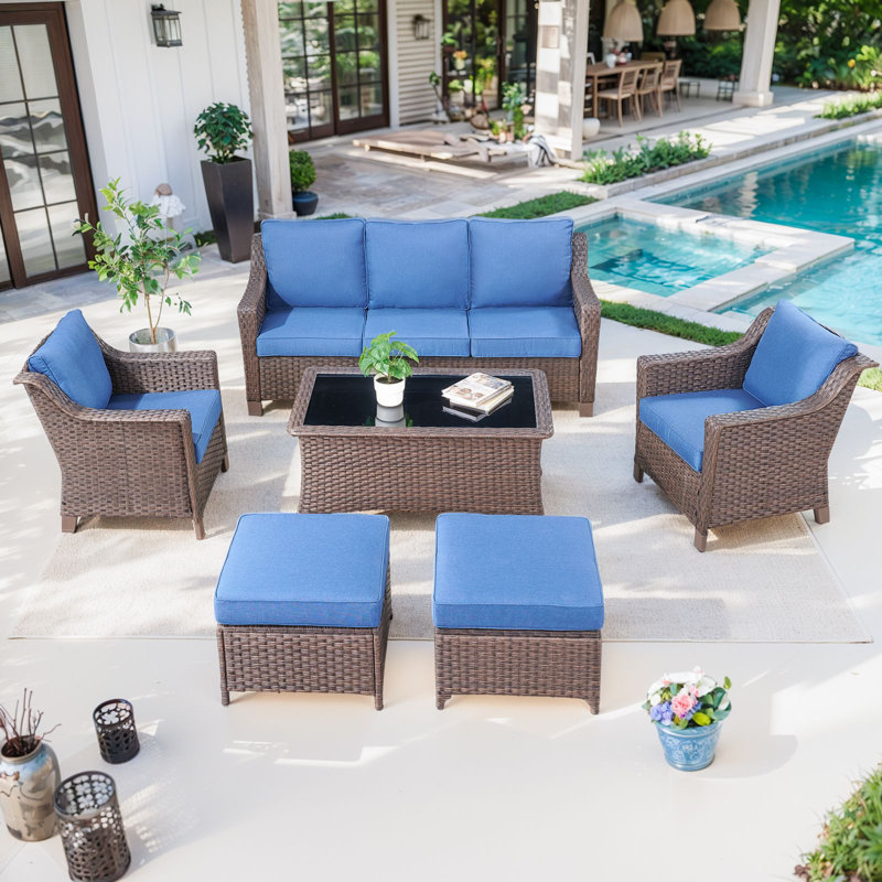 Ensemble de meubles d'extérieur en osier avec canapé, fauteuils club, repose-pieds et table basse Jenesys - Durable, élégant