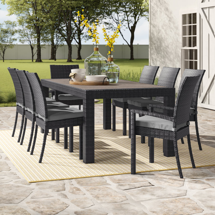 Fionnula 8 - Person Rectangular Outdoor Dining Set with Cushions