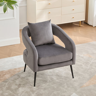 Fauteuil demi-tonneau en velours