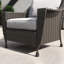 Chaise de patio avec coussins et repose-pieds