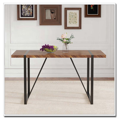 Rectangular Dining Table With A Specially Textured Top And Black Metal Legs