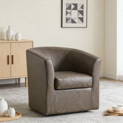 Fauteuil demi-tonneau pivotant en similicuir