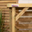 Cemaliye 112cm W x 56cm D Wood Log Store