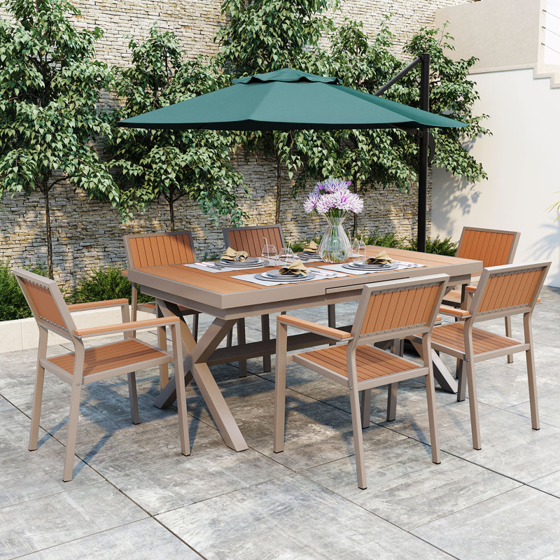Experience Outdoor Dining Freedom With A Flexible Set Including Six Chairs And A Table That Extends From 62.9 To 82.6 Inches For Personalized Arrangements