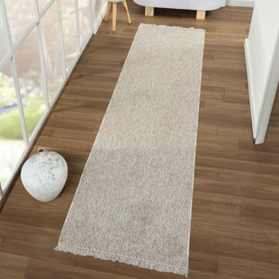 Tapis texturé à franges