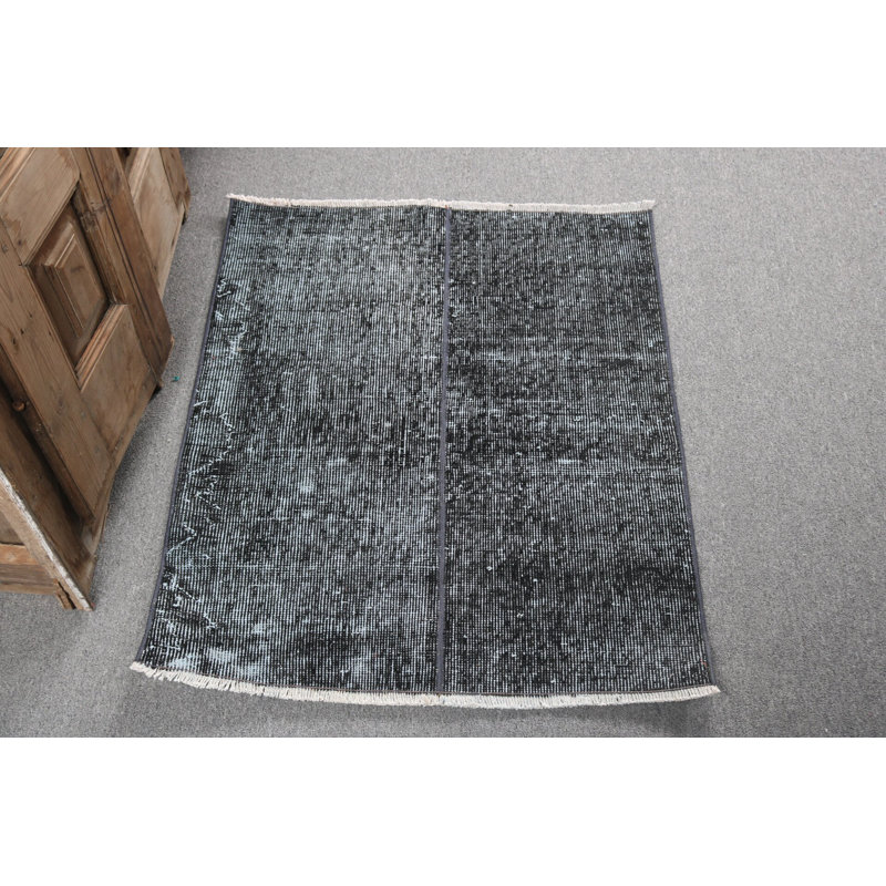 Tapis turc noir unique tissé à la main avec frange décorative