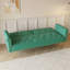 Un canapé-lit de 69,7 pouces de long recouvert de velours vert, doté d'une garniture cloutée et d'un coussin décoratif assorti