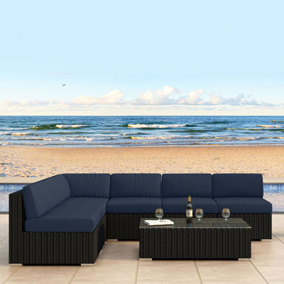 Suffern 7 Piece Rattan Sunbrella Sectional Seating Group with Cushions -  Wade Logan®, E9DC7B087A9144C99A0CF468076F4BC2