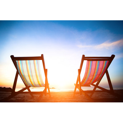 Beach Loungers At Sunrise by DimaBerkut - Wrapped Canvas Print