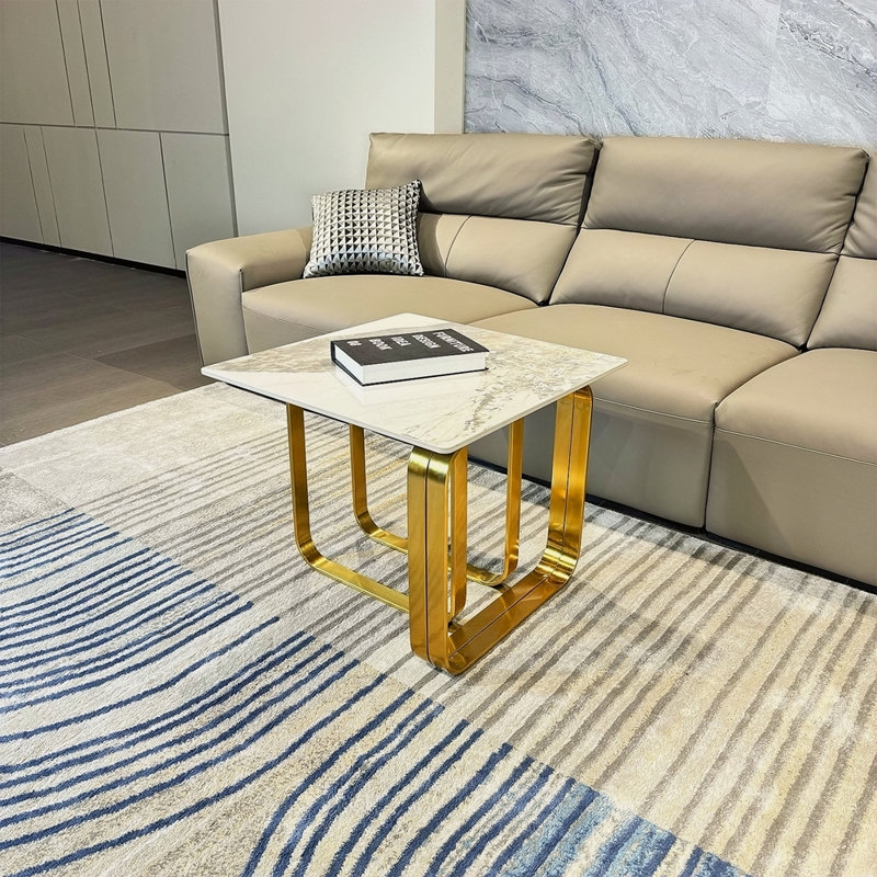 Table de bout rectangulaire avec plateau en pierre frittée, structure en métal doré pour le salon