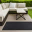 Tapis intérieur / extérieur noir tissé à la machine Estivalis-646265751