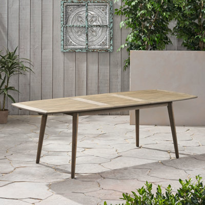 Table d'extérieur en bois de couleur grise - classique et extensible offrant amplement d'espace pour les repas