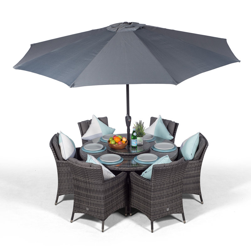 Karcher 6 - Person Wicker Patio Dining Set with Round Table , Cushions Included