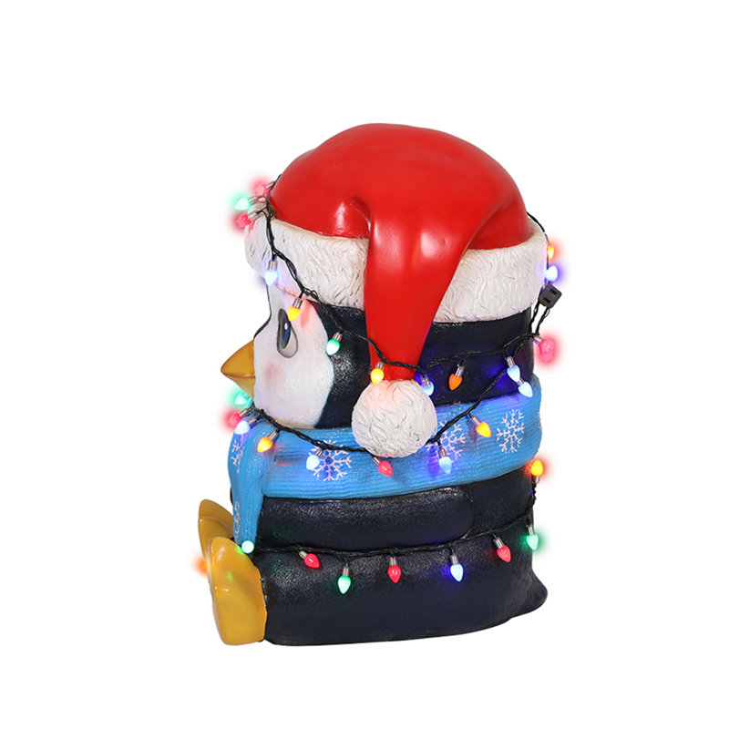 Bébé pingouin avec lumières