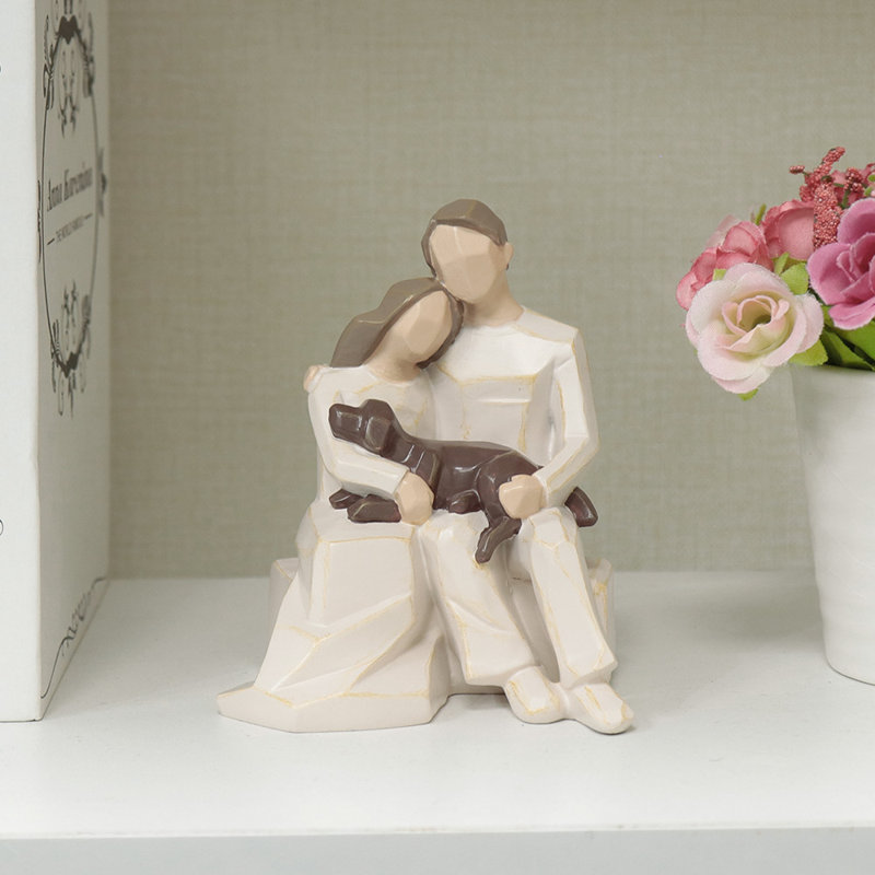 Couples Sit On Stools Holding Dogs