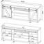 Meuble télé 2 portes en bois d'ingénierie fini bois flotté gris, idéal pour le salon. Style rustique et rangements pratiques. Convient à tous les espaces. Facile d'accès.