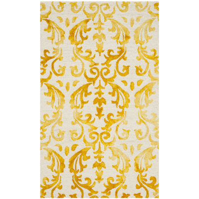 Tapis en laine / coton touffeté à la main Berman en ivoire / or