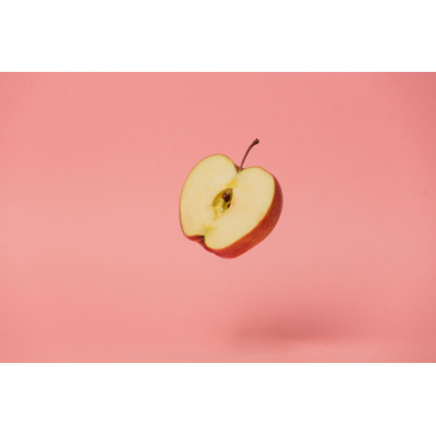 Half Apple In Air by Massonstock - Wrapped Canvas Print
