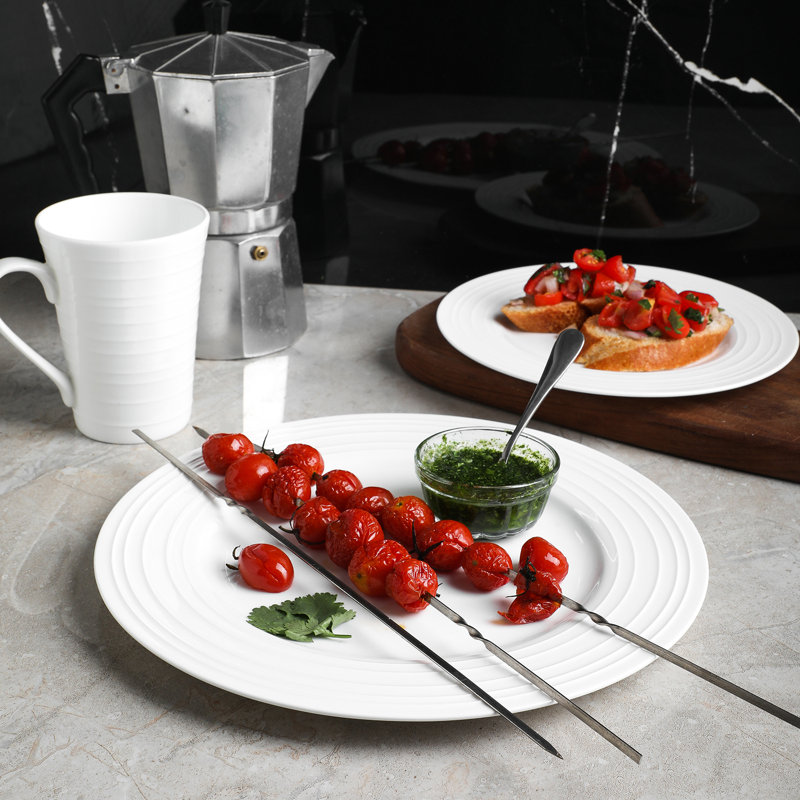 Elegant White Porcelain 16-Piece Dinnerware Set with Swirl Design