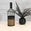 Bouteille de vin en métal avec bougie à piles