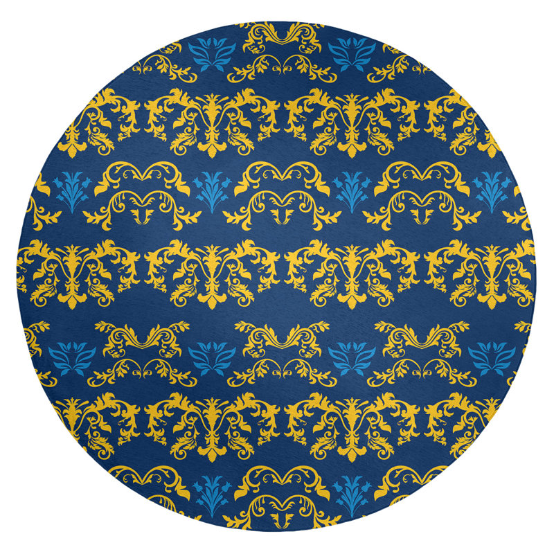 Tapis rond bleu damassé à motif baroque