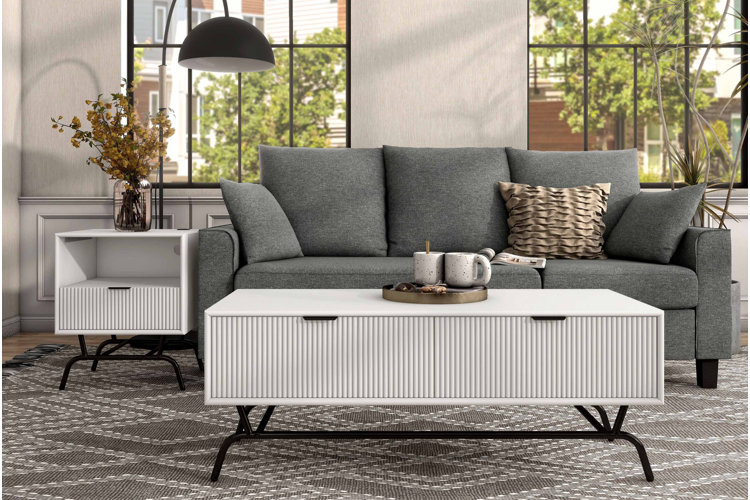 modern white rectangular coffee table with black metal base in contemporary living room