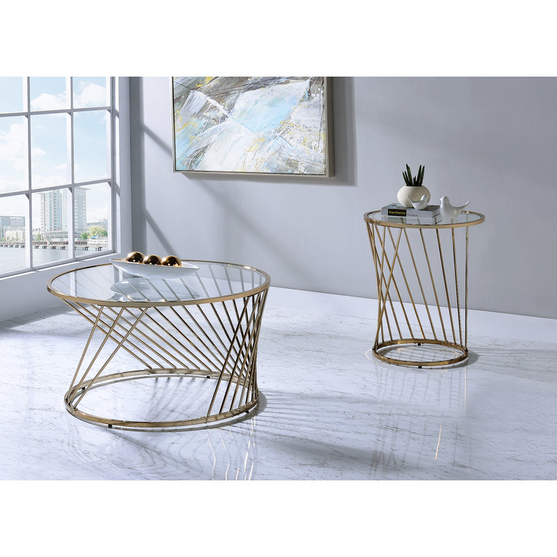 Table basse en verre transparent avec finition champagne Bluelipe