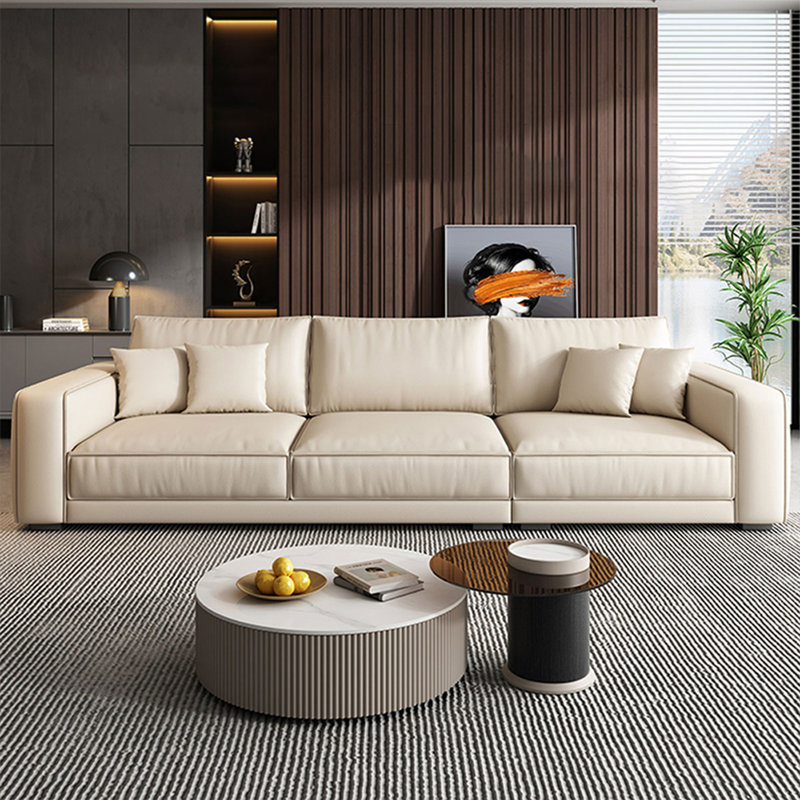 Canapé modulaire beige en cuir véritable