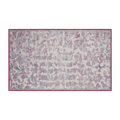 Tapis beige lavable à la machine