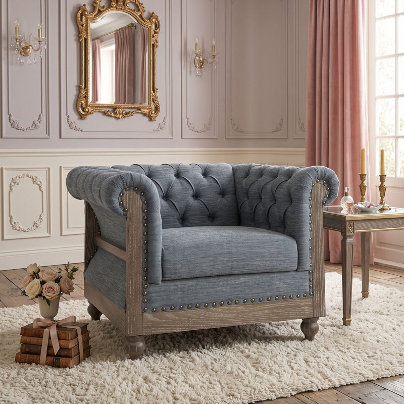 Fauteuil club capitonné d'inspiration Chesterfield avec accoudoirs