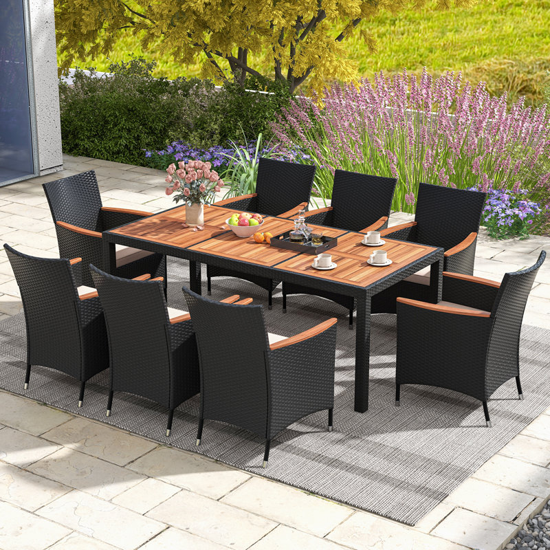 Nysa 8 - Person Acacia Wicker Patio Dining Set with Rectangular Table , Cushions Included