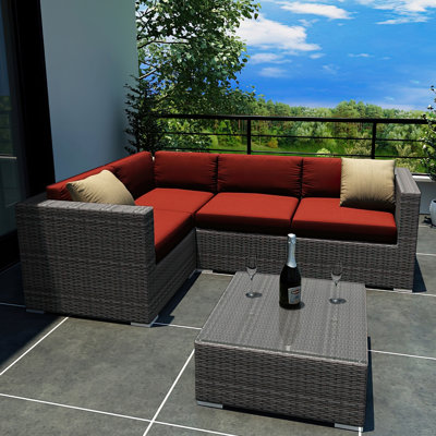 Suffern 5 Piece Rattan Sunbrella Sectional Seating Group with Cushions -  Wade Logan®, 341107AE88F0485BAC5D9152F4FA5419