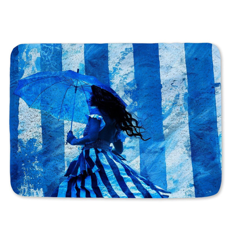 Femme avec tapis de bain parapluie