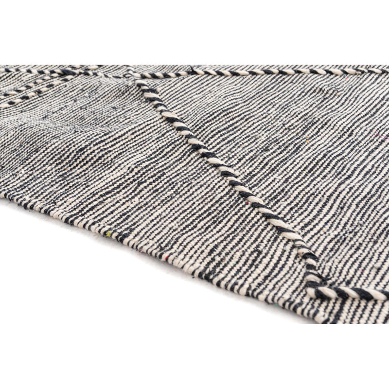 Tapis noir et blanc Orpheus