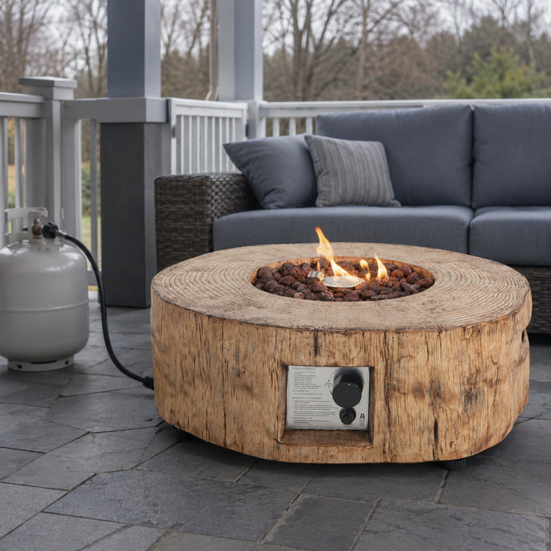 Table ronde pour foyer d'extérieur au propane 30 000 BTU avec finition grain de bois, pierres de lave et housse de protection