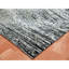 Tapis noir en laine nouvel âge 6 pi x 9 pi Poisson unique