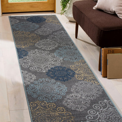 Tapis gris touffeté Combien