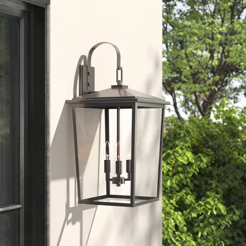 Messerly 3 Light 24" Tall Outdoor Wall Sconce, Bronze