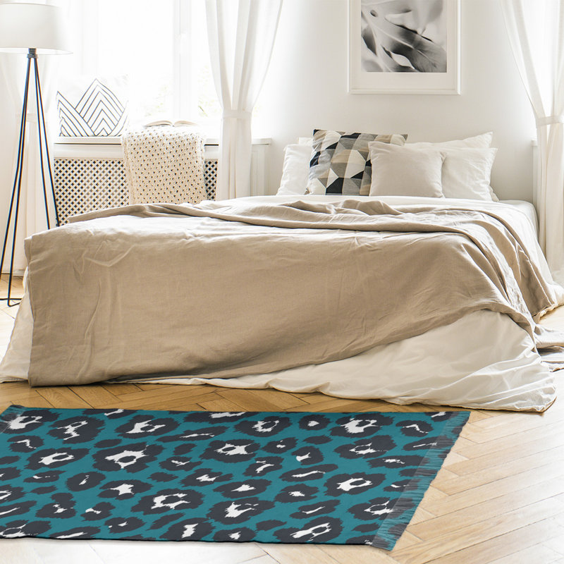 Tapis bleu sarcelle / noir à imprimé animal