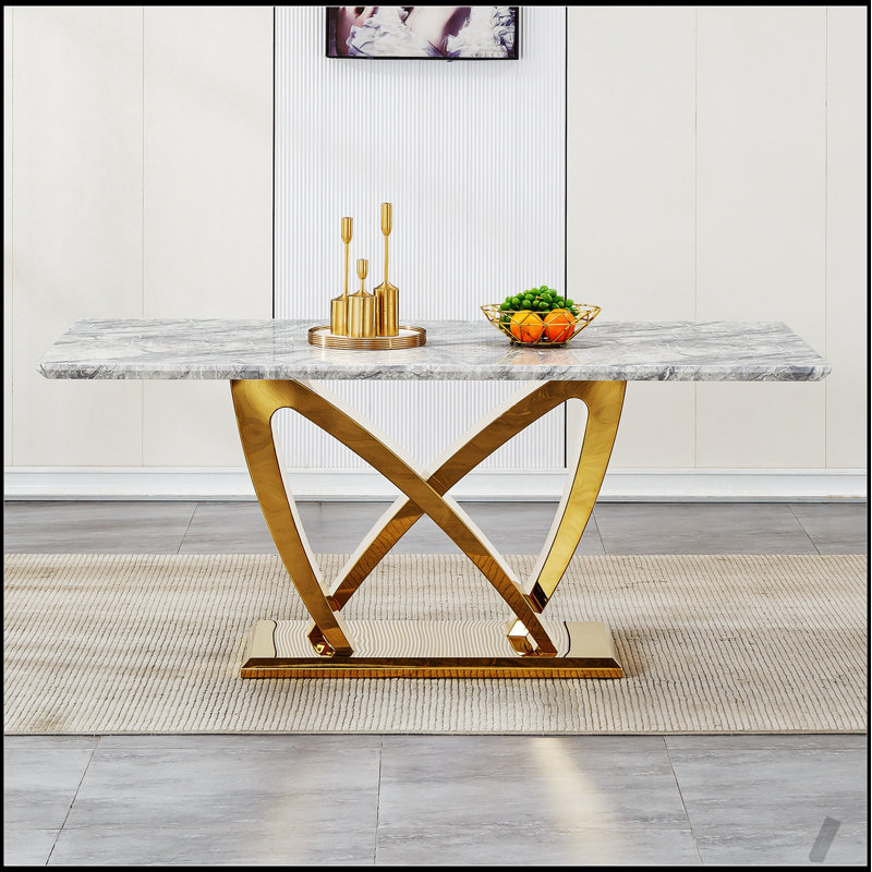 Élégante table de salle à manger rectangulaire en faux marbre 70 po avec base en acier inoxydable à finition miroir, parfaite pour les salles à manger modernes et spacieuses