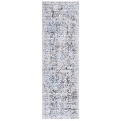Tapis bleu uni en polyester tissé à la machine Talena