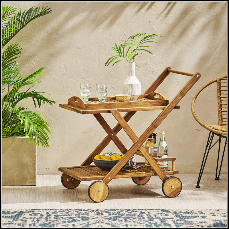 Chariot-bar Riviera avec bois d'acacia durable, rangement spacieux et roulettes lisses pour une réception élégante