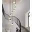 Lustre moderne en cristal pour plafonds hauts, luminaire suspendu réglable avec abat-jour en cristal K9, convenant au vestibule, à l'escalier et au salon