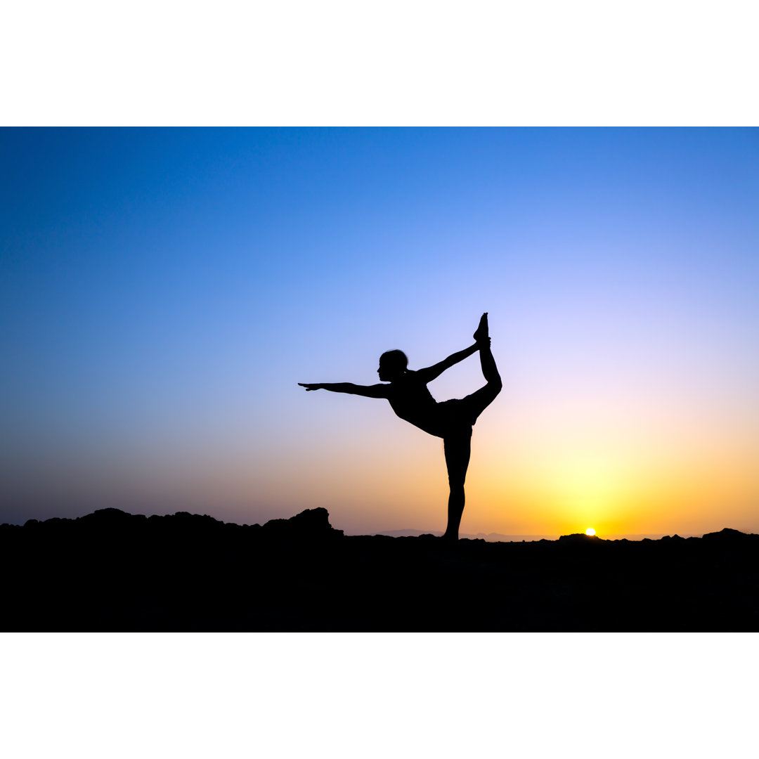 Leinwandbild Woman Doing Yoga Natarajsana Silhouette