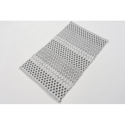 Tapis géométrique beige / gris en coton tissé à plat à la main