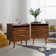 Sebrina Mid-century Modern 3 - Drawer 28“ Tall Nightstand with Built-In Outlets and Solid Wood Legs
