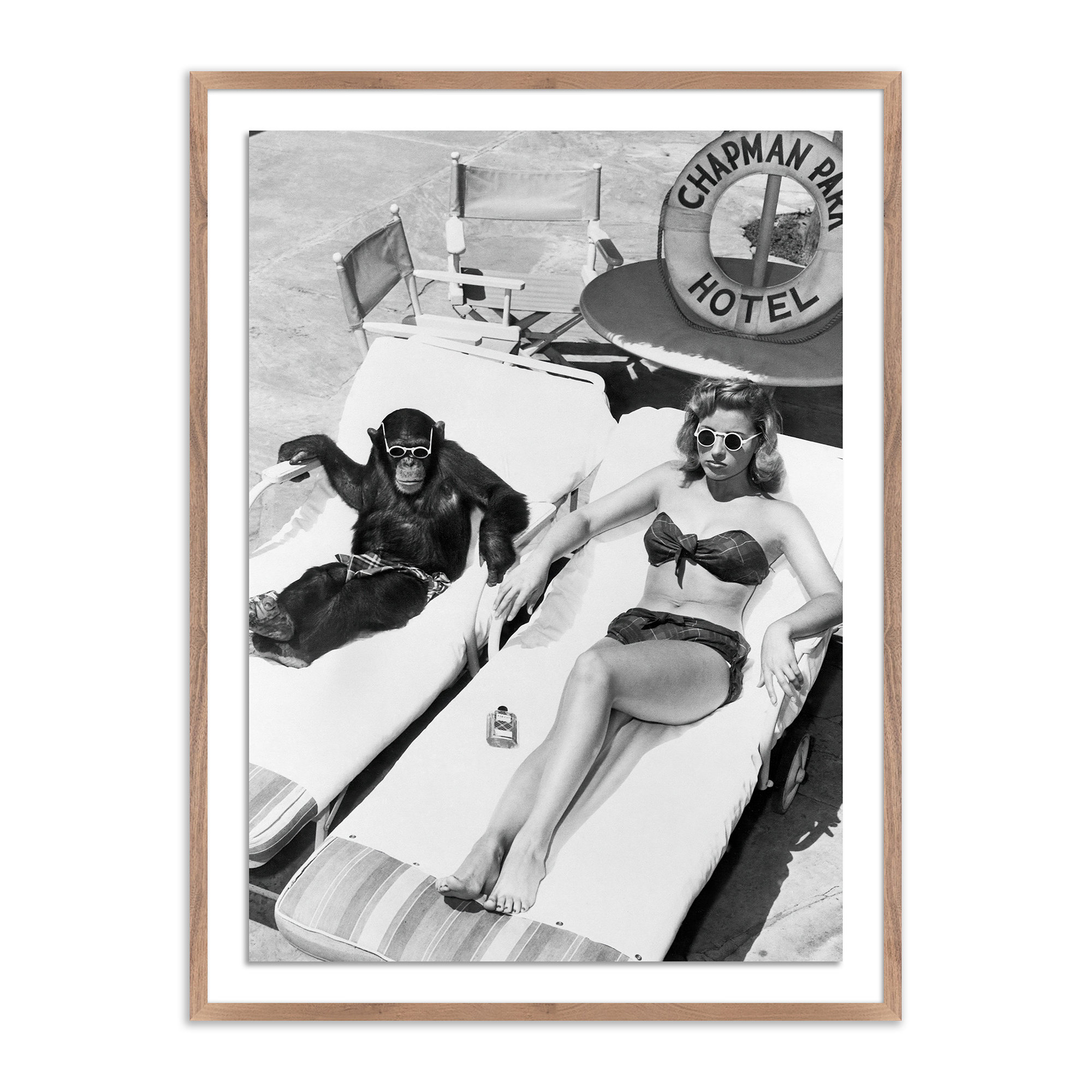 Woman Sunbathing With Chimpanzee by Getty Images, Rustic Walnut Framed, 40" H x 30" W
